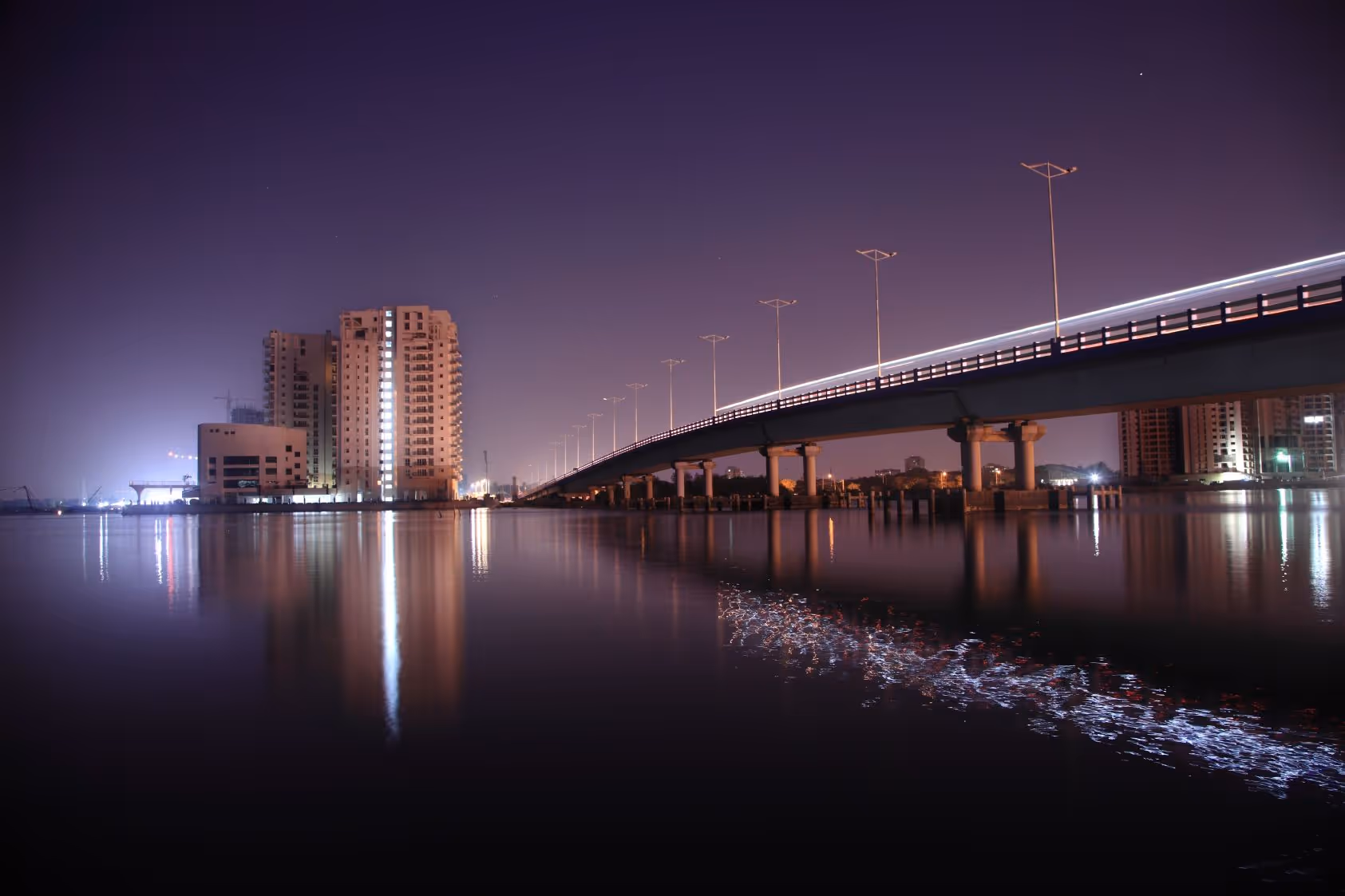 A nigh time view of a bridge in Kochi, India