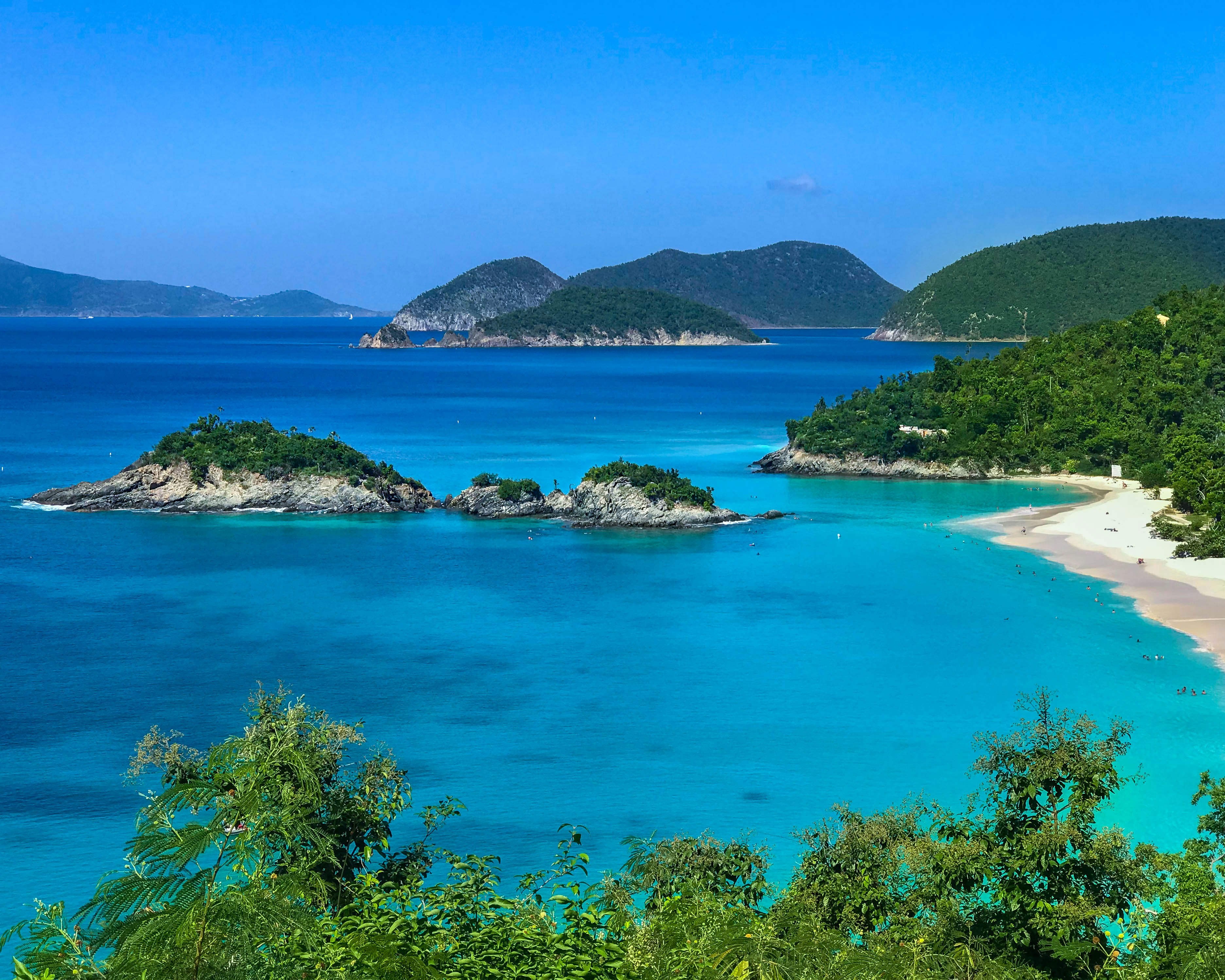 Caribbean turquoise bay view from Cruz Bay St. John near DGMI Properties luxury suites.