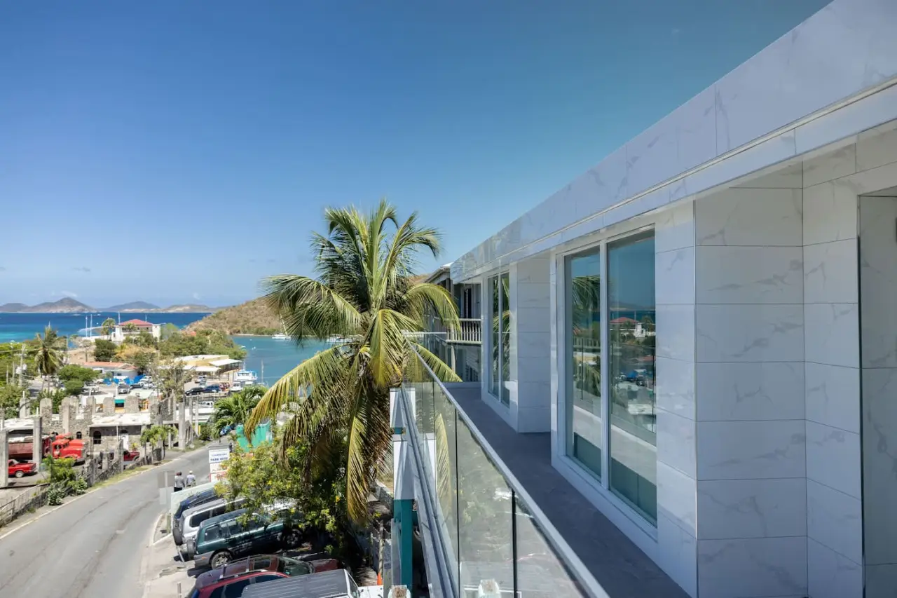 Ocean‑view balcony of DGMI Properties Cruz Bay apartments in St. John US Virgin Islands.”