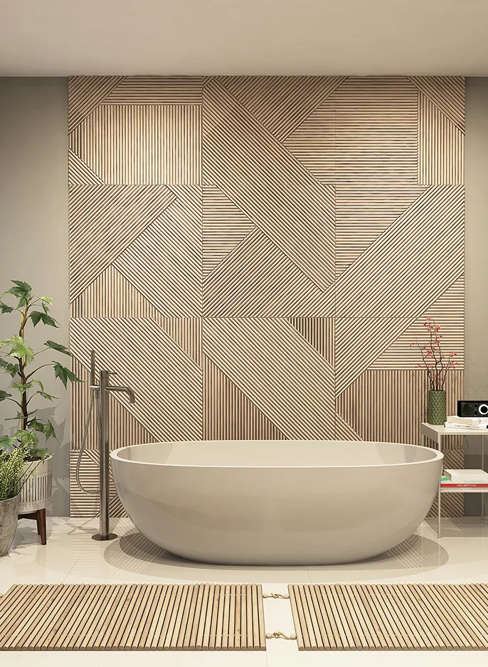 Freestanding tub in front of a patterned wood feature wall in a luxury bathroom renovation.