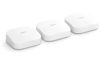 Three eero routers, in a line