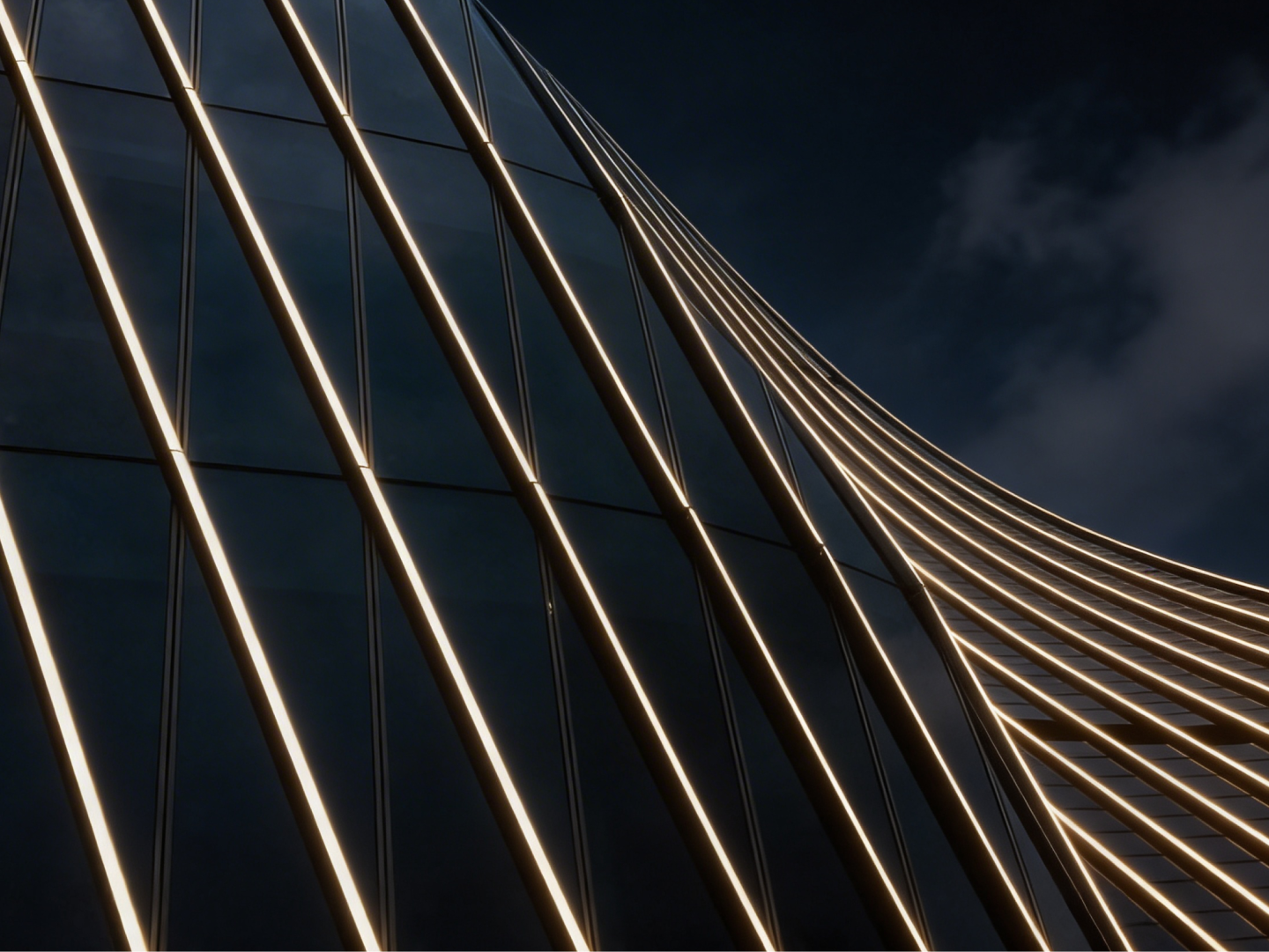 Glass building with metallic beams