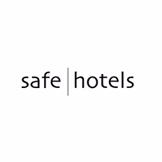 "safe hotels" text logo with a vertical line separating the words.