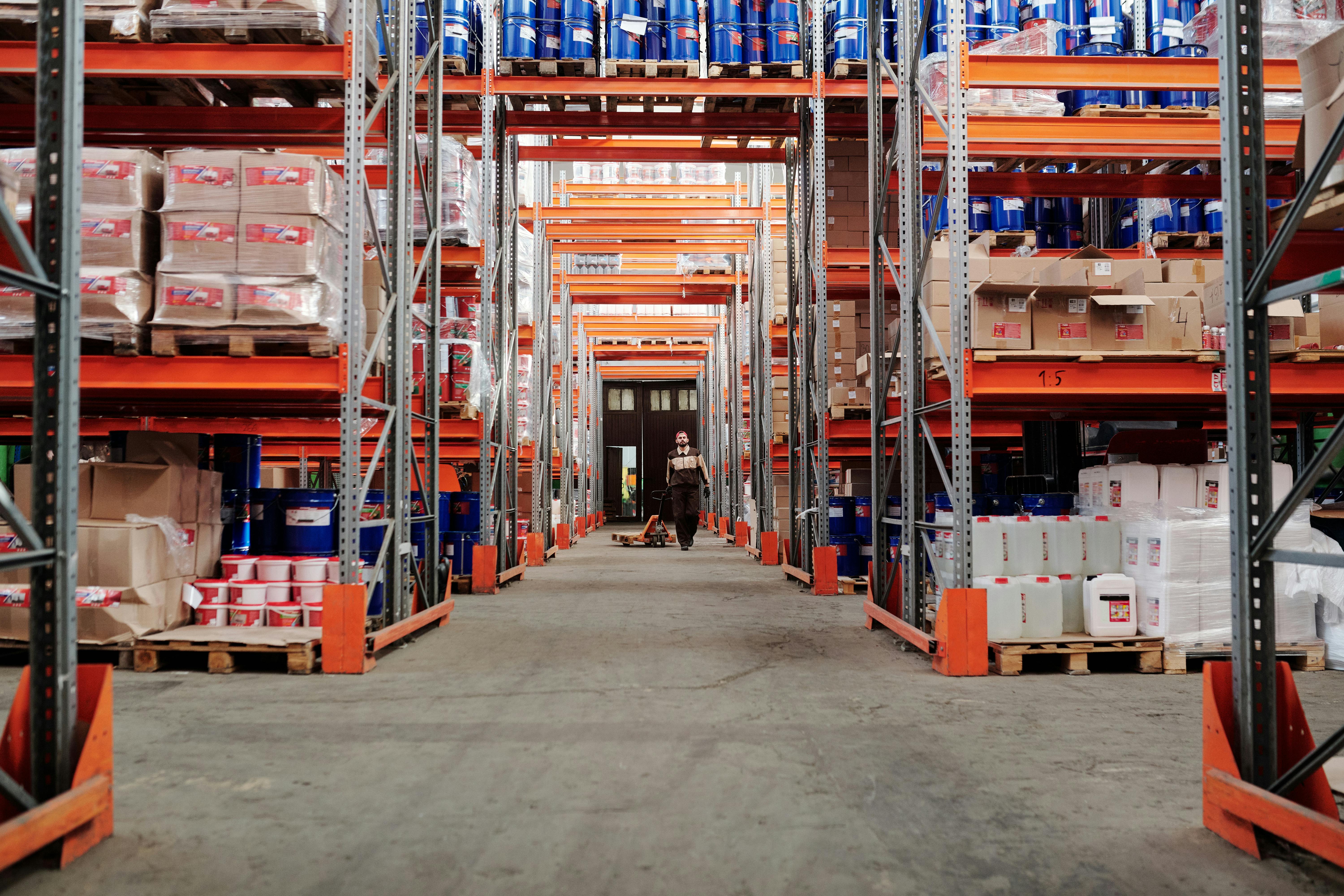 Large warehouse floor showing high-volume inventory movement and activity