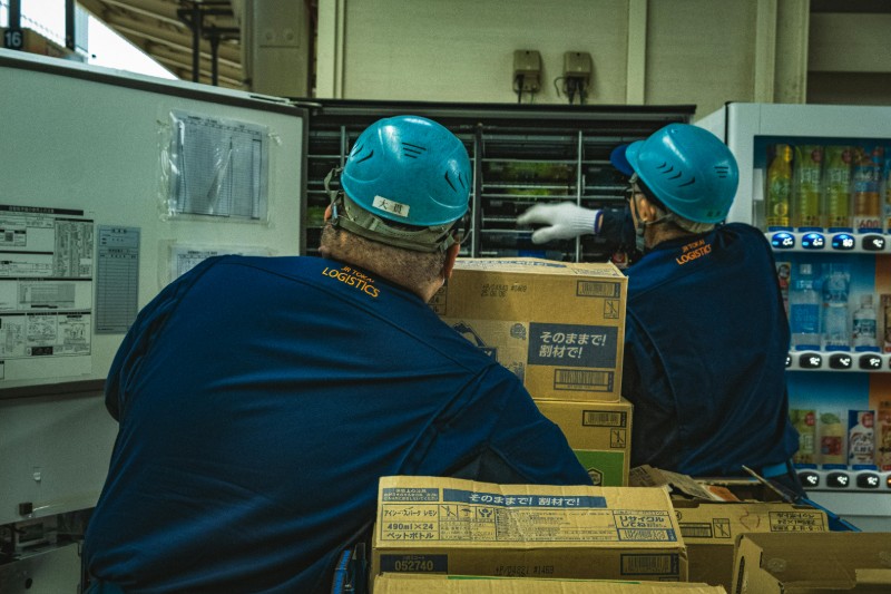 Warehouse scanning process selecting food inventory by expiration date.