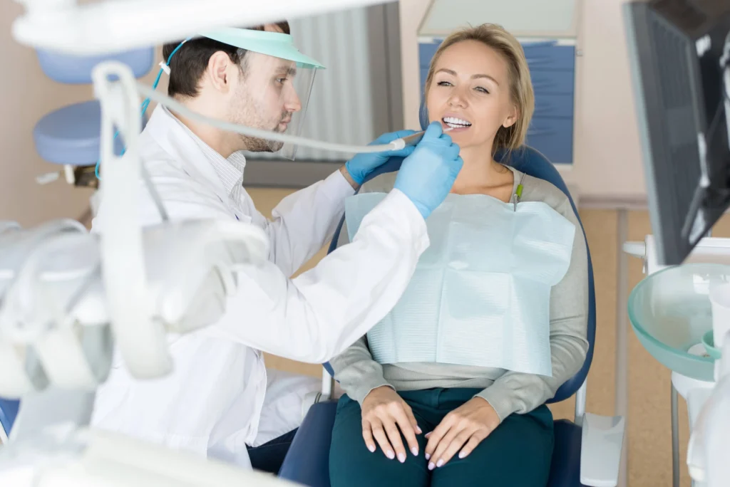 woman getting dental crowns Davie FL
