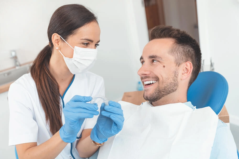 Man undergoing Invisalign in Davie