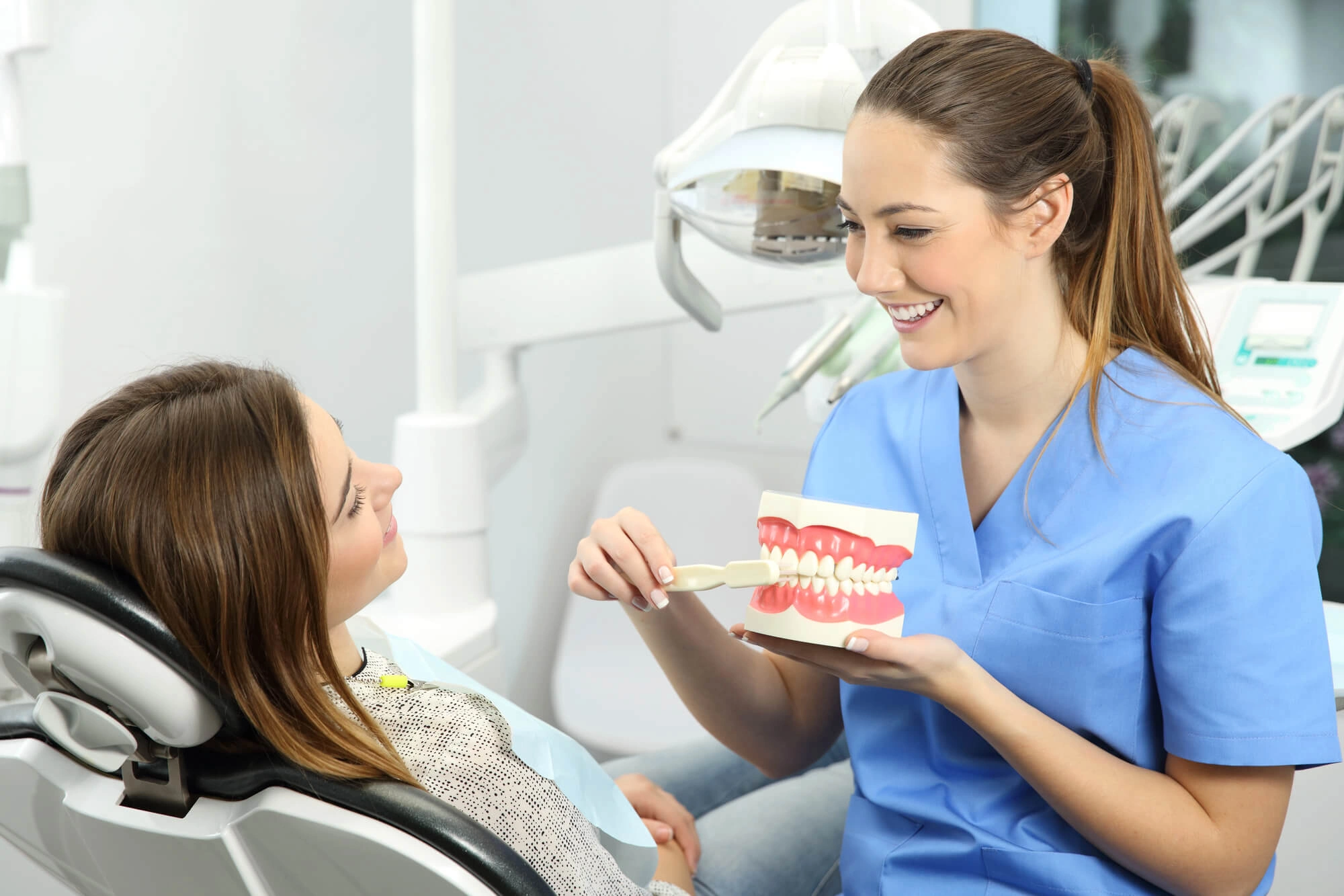 Periodontist Davie FL showing how to brush teeth