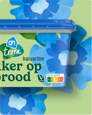 Container of AH Terra plant-based halvarine with Nutri-Score and vegan label on a green background with blue flower illustrations.