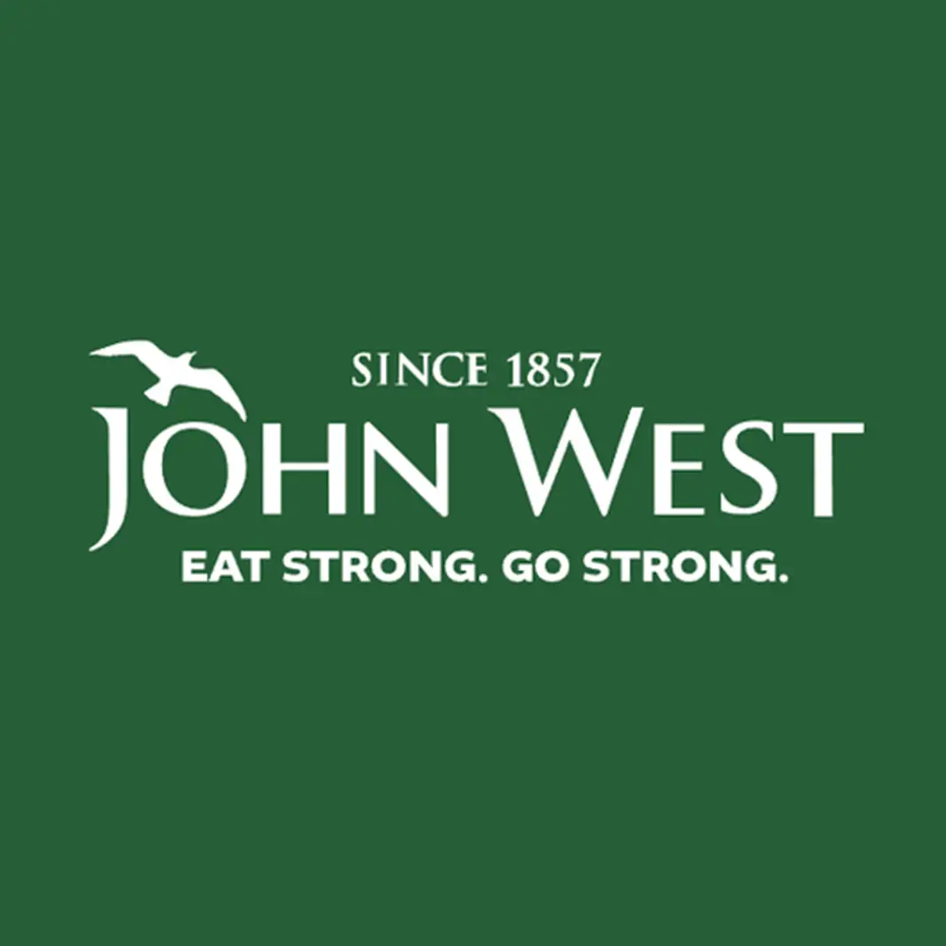 John West logo with a bird silhouette and the text 'Since 1857' and slogan 'Eat Strong. Go Strong.' on a green background.