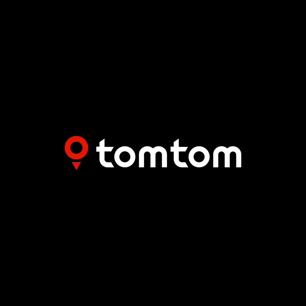 TomTom logo with red location pin icon and white text on black background.