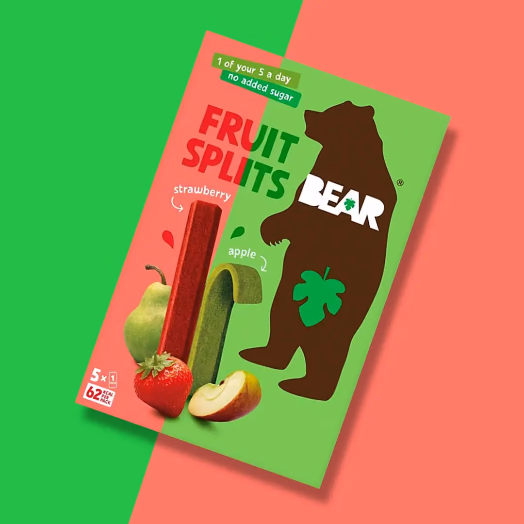 Box of Bear Fruit Splits strawberry and apple flavor fruit snacks with a bear silhouette on green and pink background.