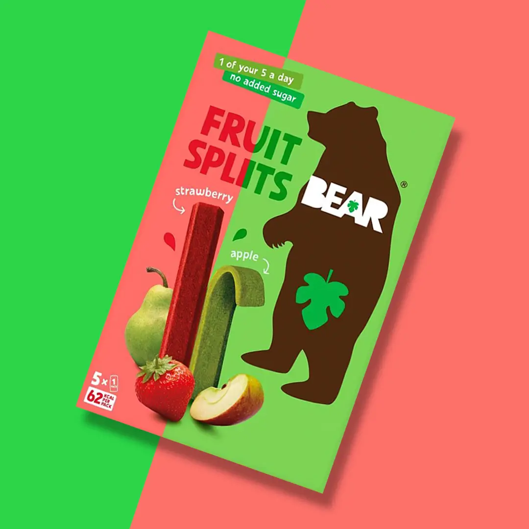 Box of Bear Fruit Splits strawberry and apple flavor fruit snacks with a bear silhouette on green and pink background.