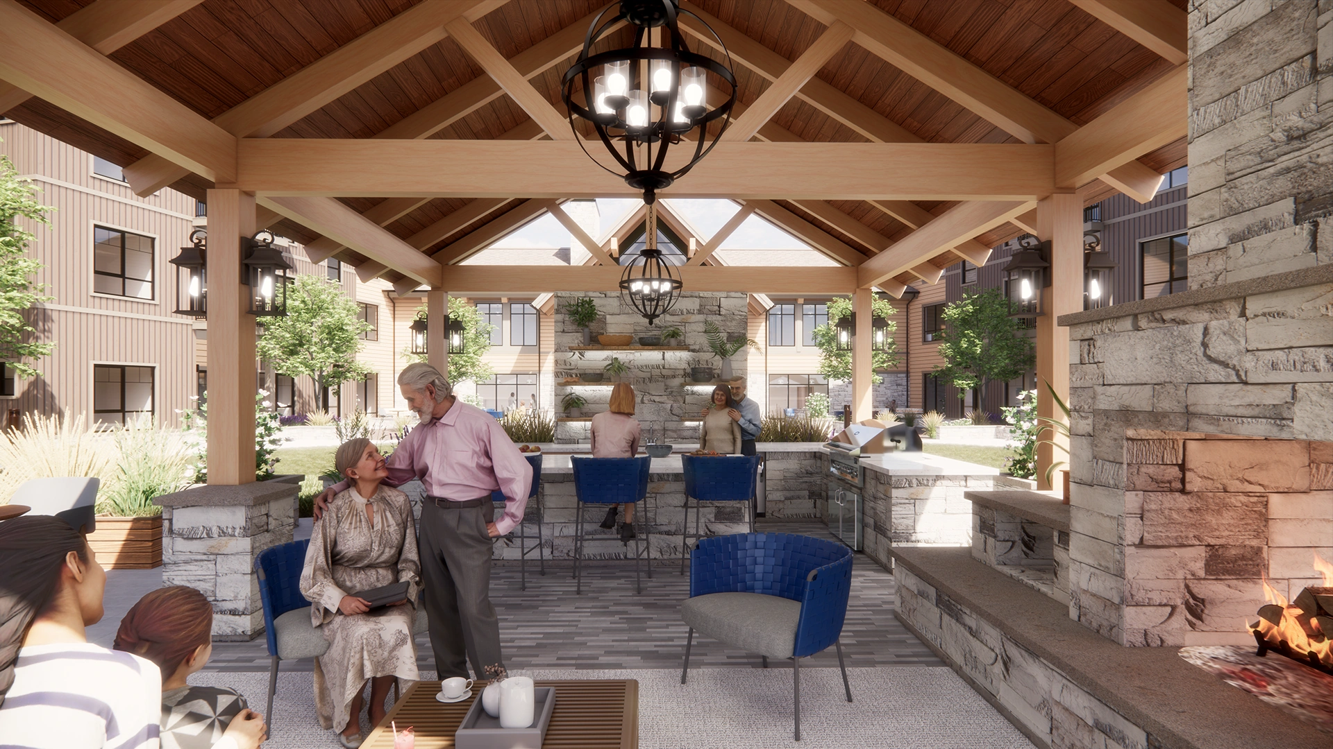 Outdoor pavilion with wooden beams, stone fireplace with fire, and an outdoor kitchen bar with people socializing and seating.