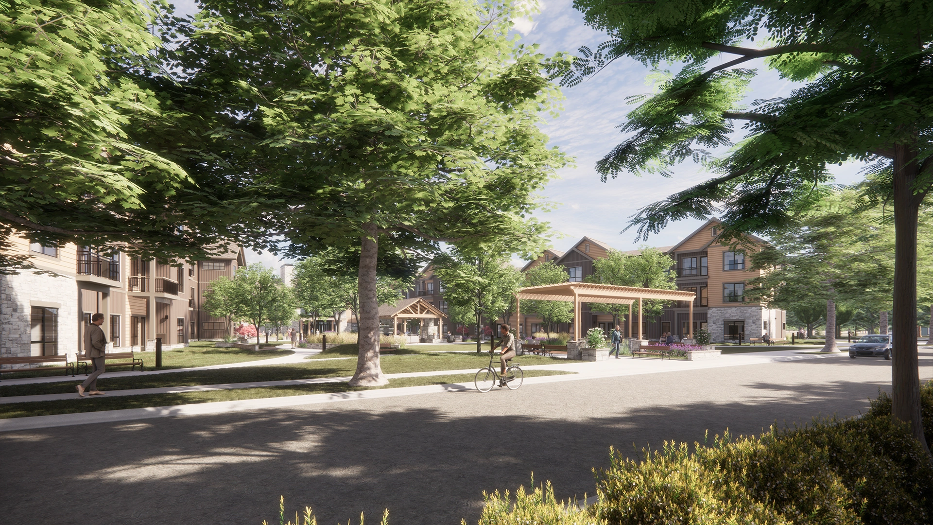 Sunny Sanavite Estates courtyard with trees, benches, a cyclist, pedestrians, and multi-story houses with wooden and stone facades.