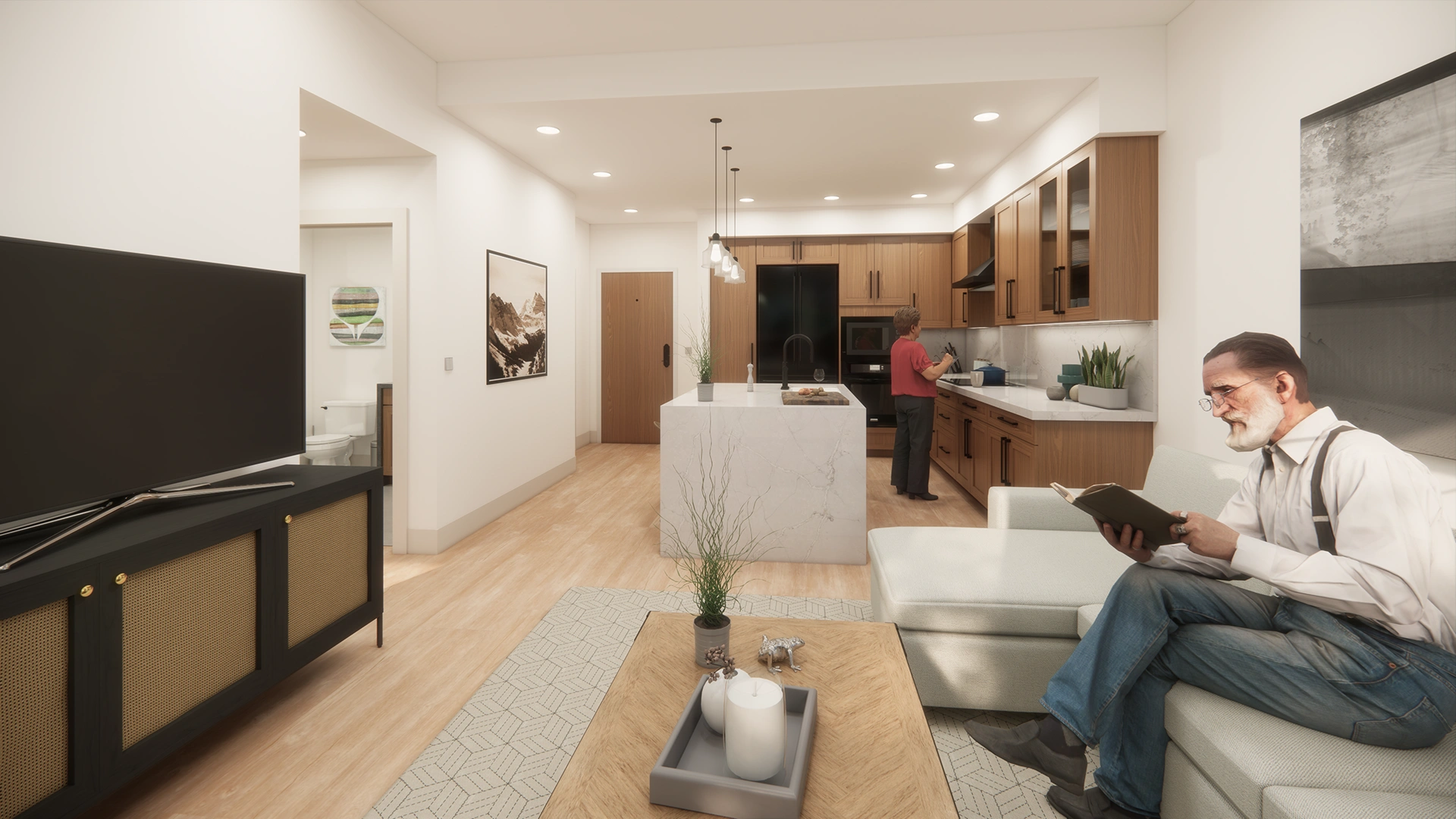 Sanavite Estates modern open-concept living room and kitchen with wood cabinets, a marble island, and two people reading and cooking.
