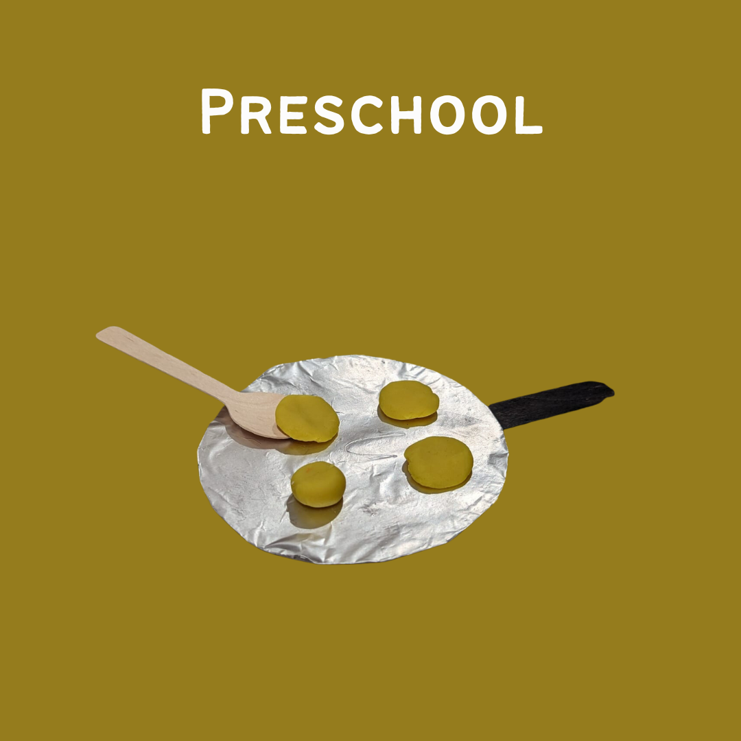 Wooden spoon cooking yellow clay pieces on a round foil pan illustration with the word PRESCHOOL above on a brown background.