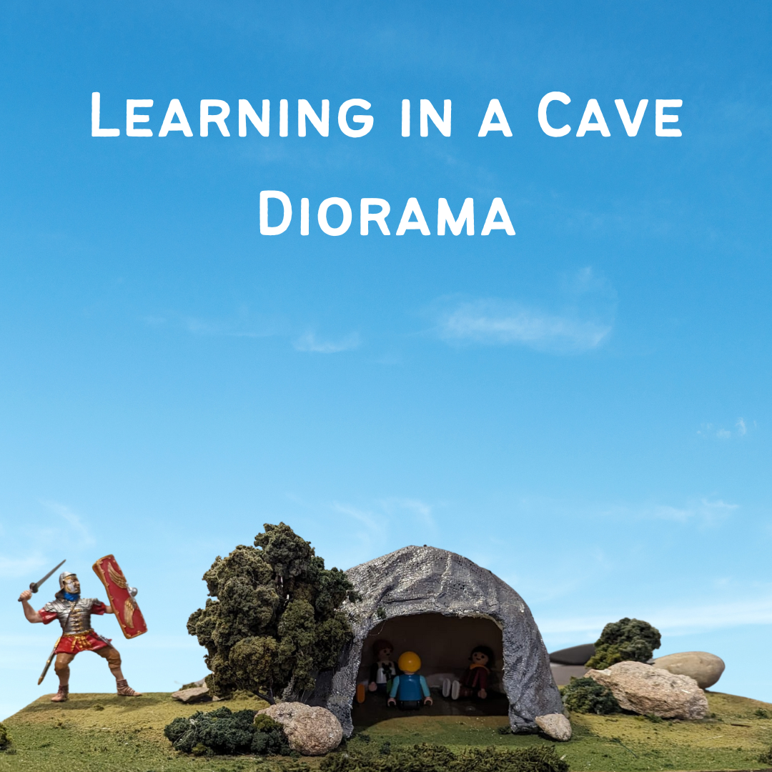 Diorama of Jewish boys learning in a cave while Greek soldier searches.