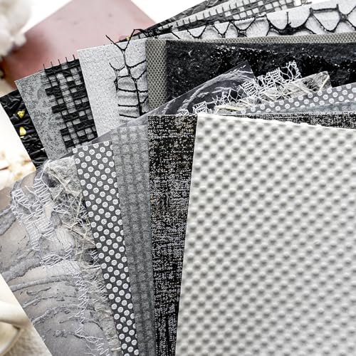 Black textured scrapbook papers and mesh fabric sheets
