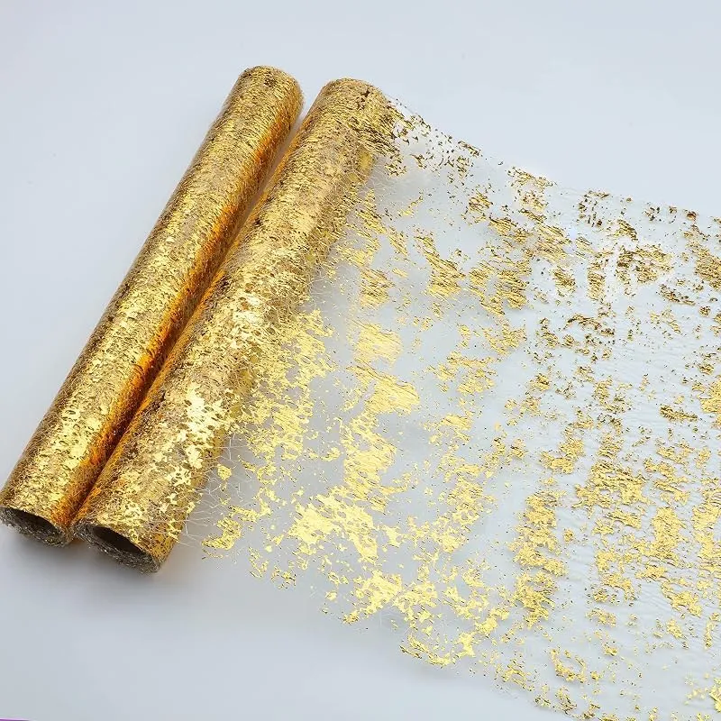 Gold table runner for a festive table setting