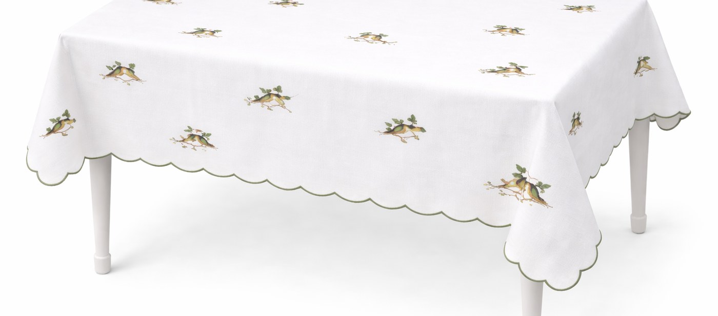 Botanical garden Sukkot table with a bird-and-branch tablecloth