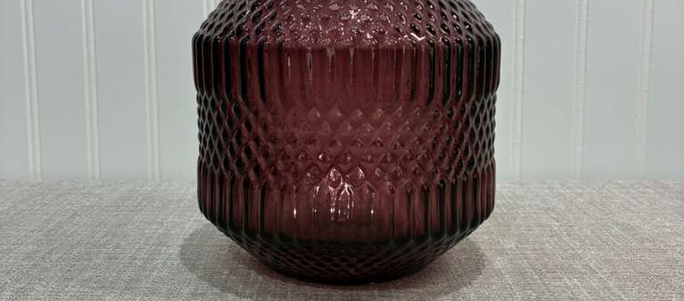 Plum harvest Sukkot table accent, a ribbed violet vase