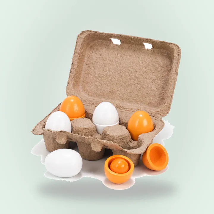Six detachable wooden play eggs