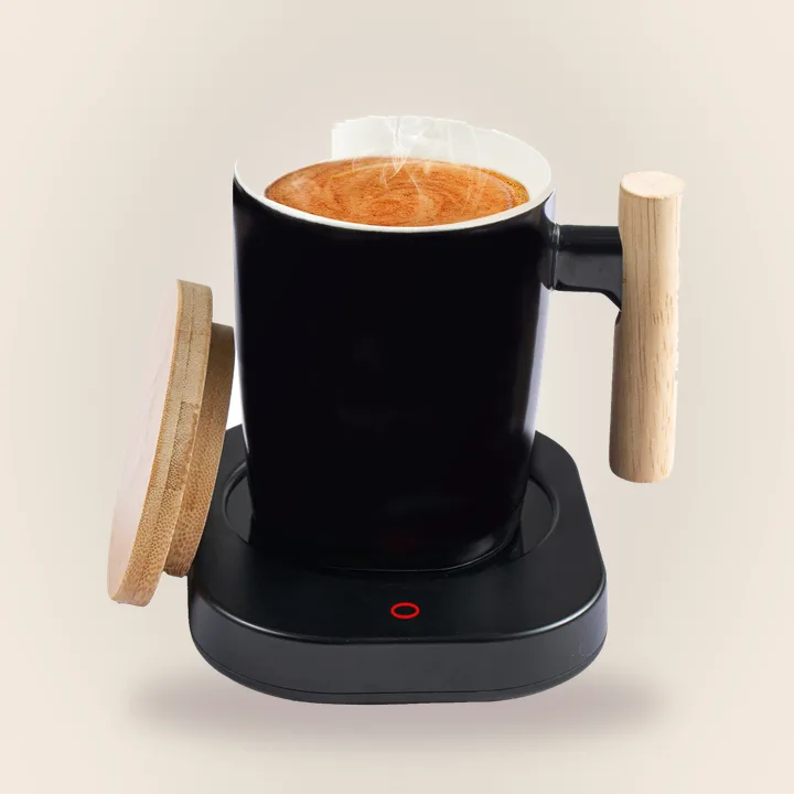 Black coffee mug warmer with a mug