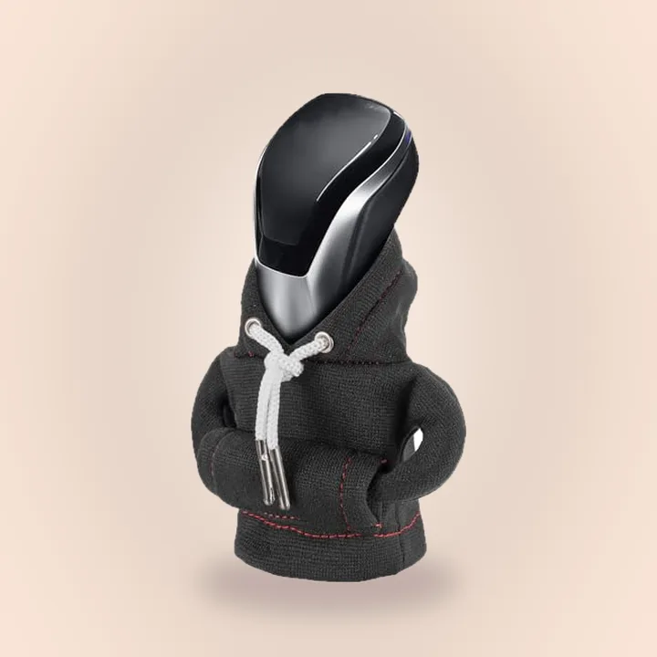 Mini hoodie cover on a car gear shift