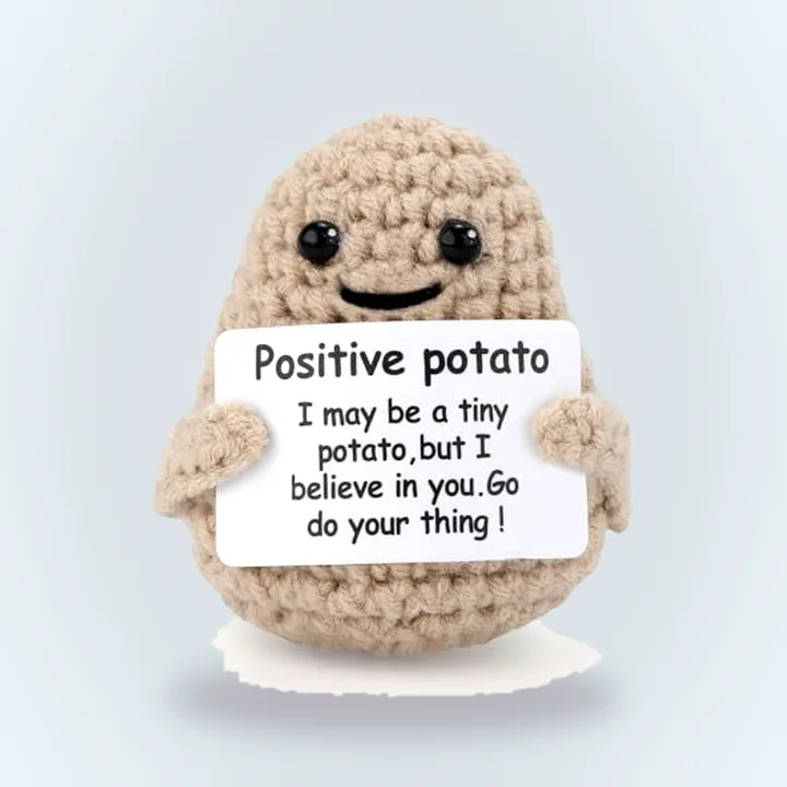 Small knitted crochet potato doll