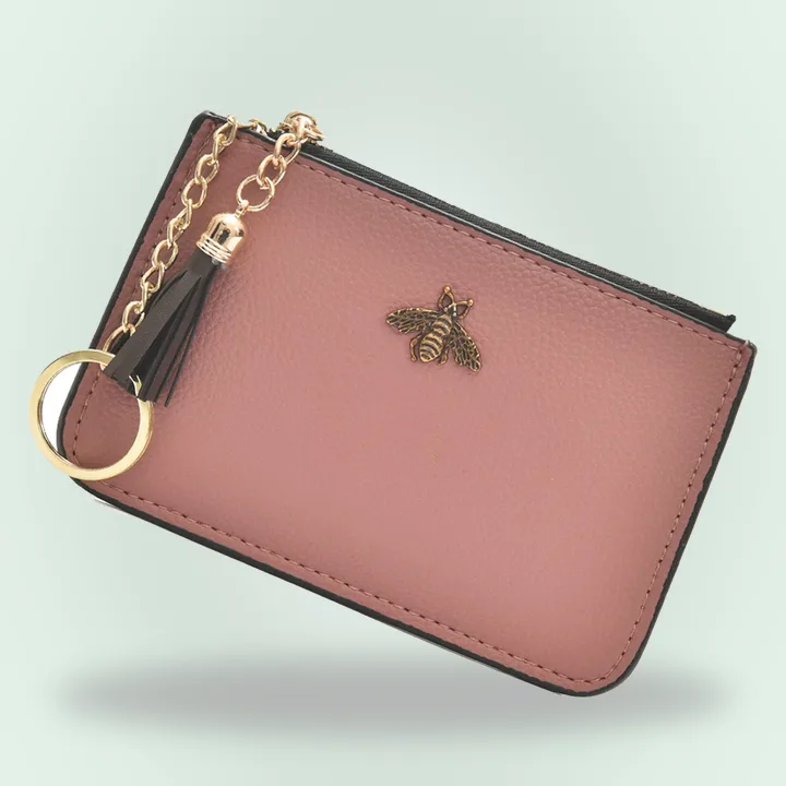 Pink coin purse with tassel keychain