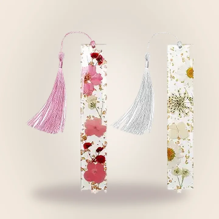 Two resin bookmarks with tassels