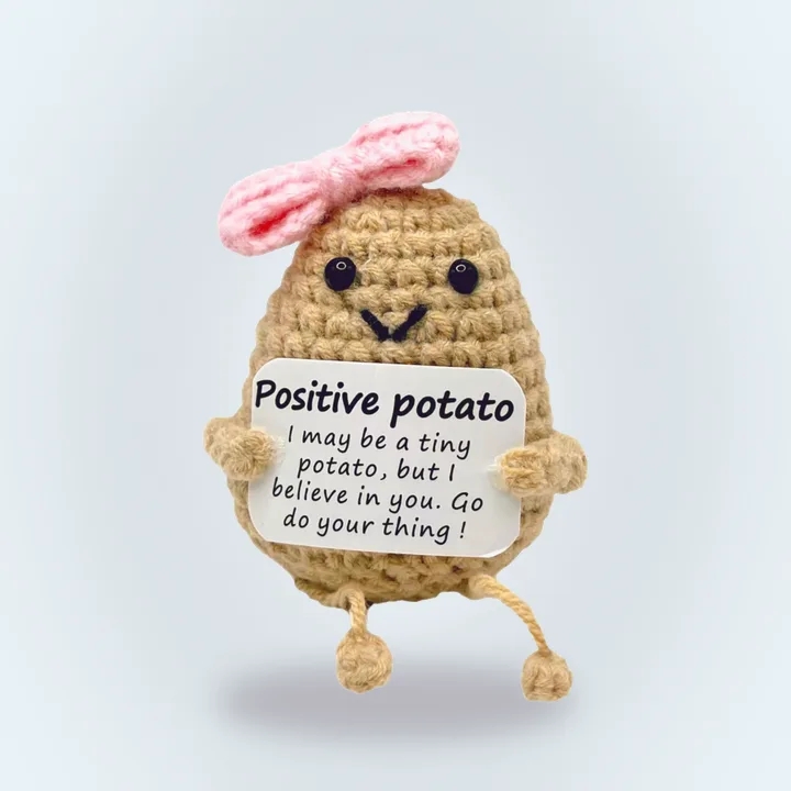Small knitted potato doll with card