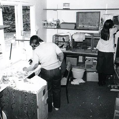 An old black and white photo of our staff at work.