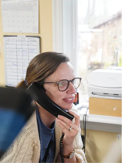 A member of our team taking a call at our Support Center.
