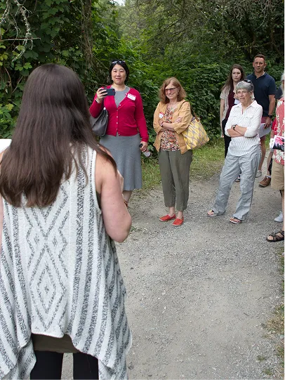 Community members listening to one of our talks in nature.