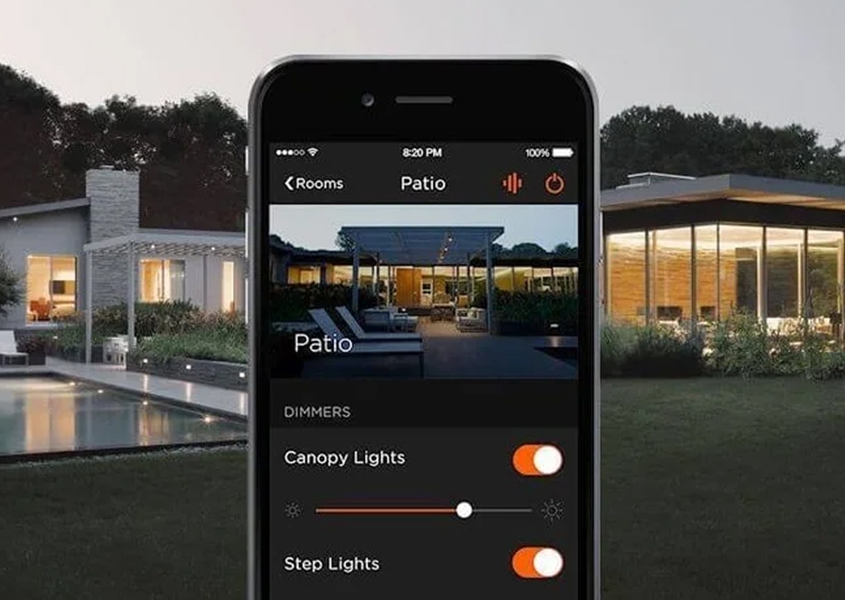 Mobile phone displaying outdoor automation app for controlling garden lights and entertainment systems.