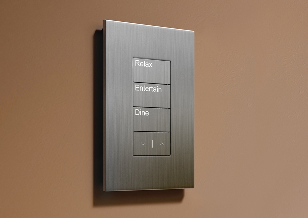 Wall-mounted smart lighting keypad with programmable scene buttons for precise architectural lighting control.