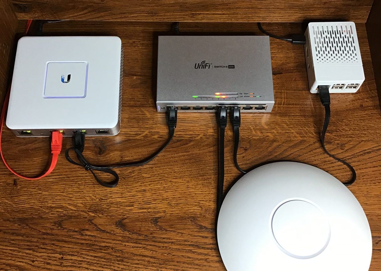 Enterprise-grade Wi-Fi router and access point setup showing TR Electronics’ professional home networking installation.