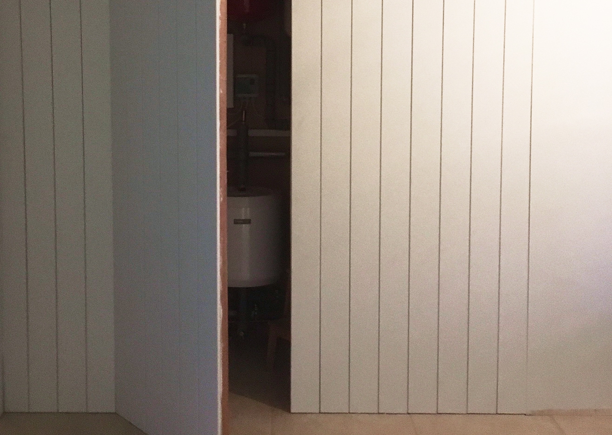 Concealed network hardware cabinet showing TR Electronics’ clean install approach for smart-home systems.