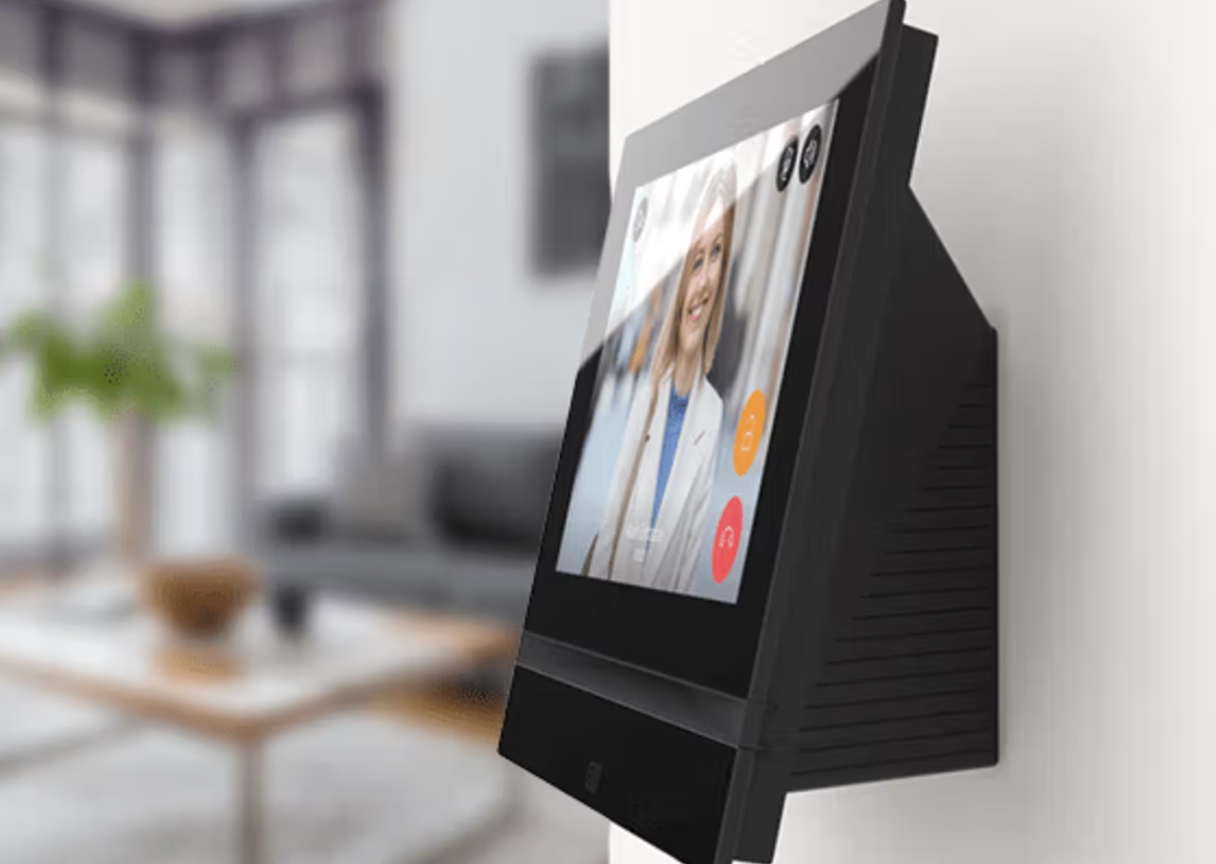 Smart touchscreen video intercom showing visitor at front door, part of TR Electronics’ remote access systems.