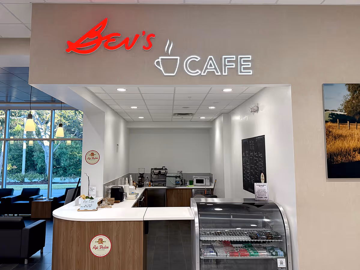 Interior view of Bev's Cafe, Shows custom fabricated sign that lights up.