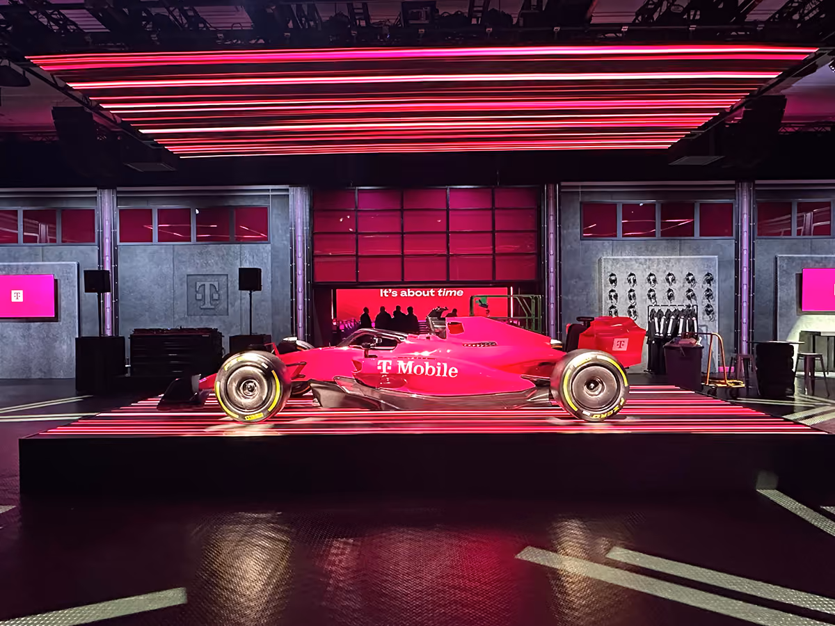 A room with beMatrix frames and SEG graphics printed and installed to showcase a F1 race car