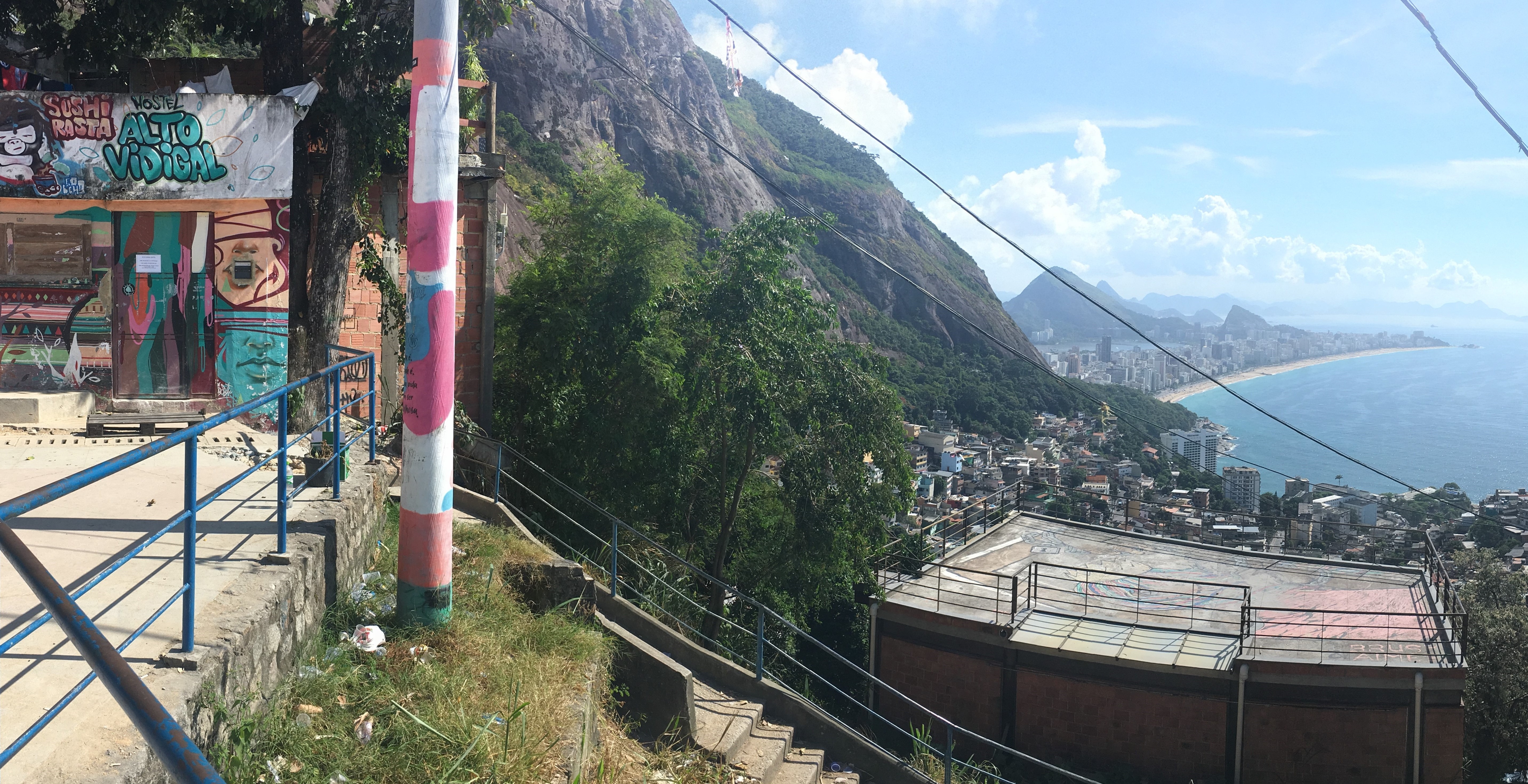 View from the top of Vidigal favela - Ipanema beach on the background