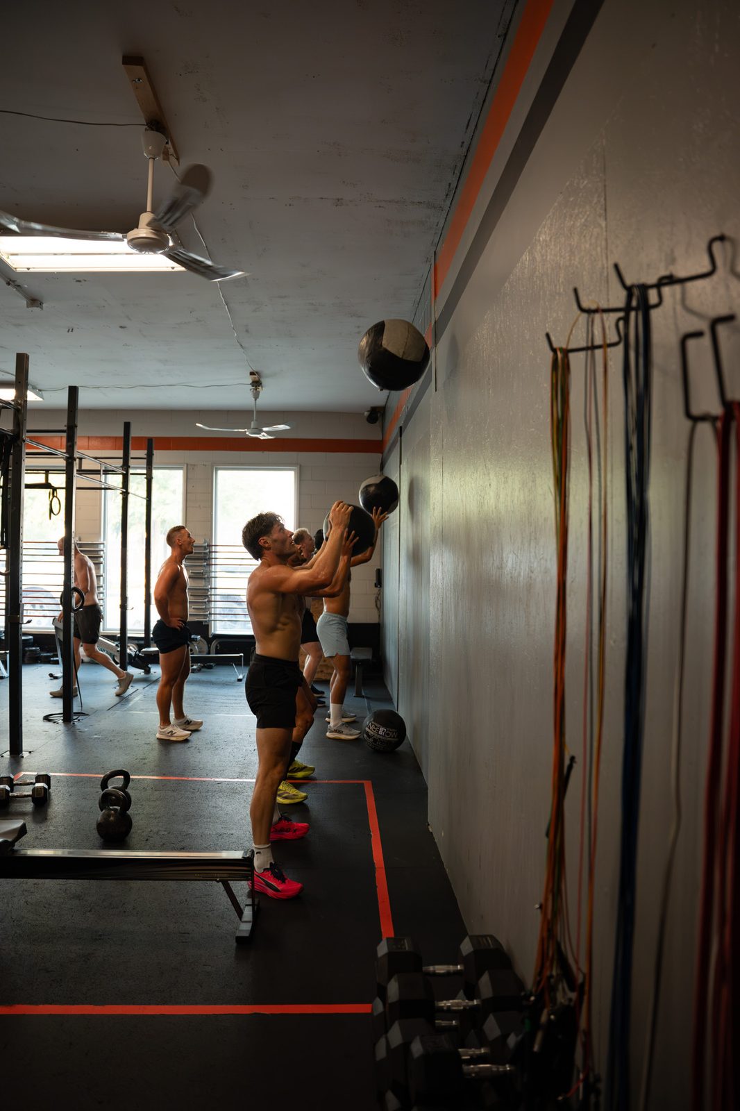 Coach guiding wall-ball training