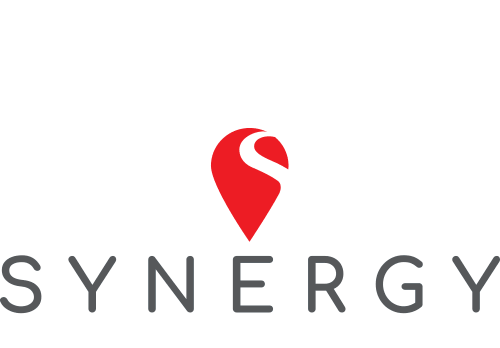 A red pin-shaped logo with an "S" symbol above the word "SYNERGY" in uppercase gray letters.