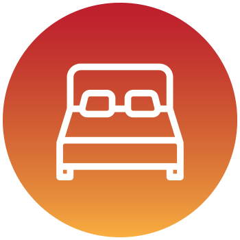 Icon of a bed with two pillows, set against a gradient red-orange circular background.