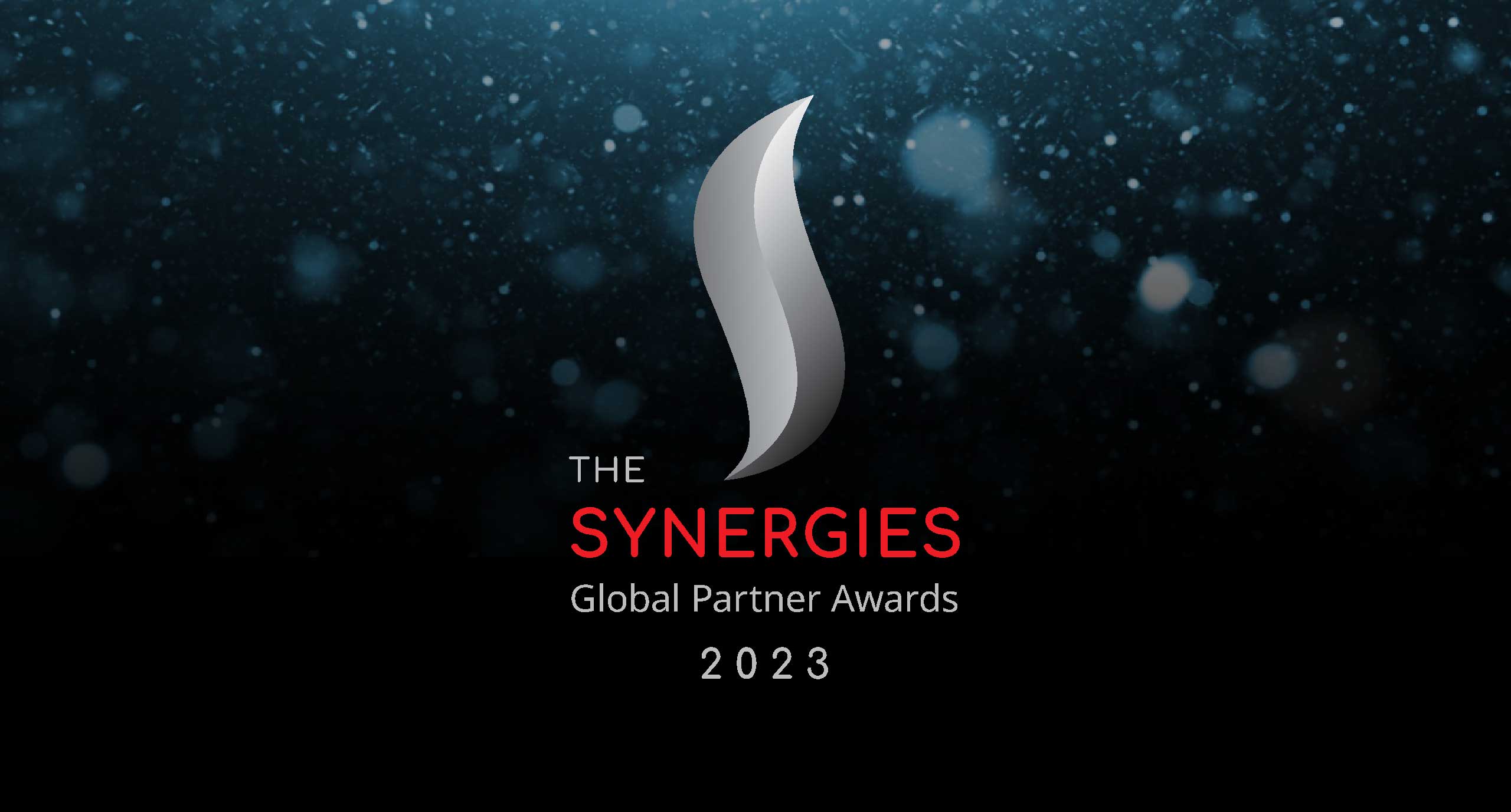 The Synergies Global Partner Awards 2023 logo features a sleek silver emblem on a dark, sparkling background.