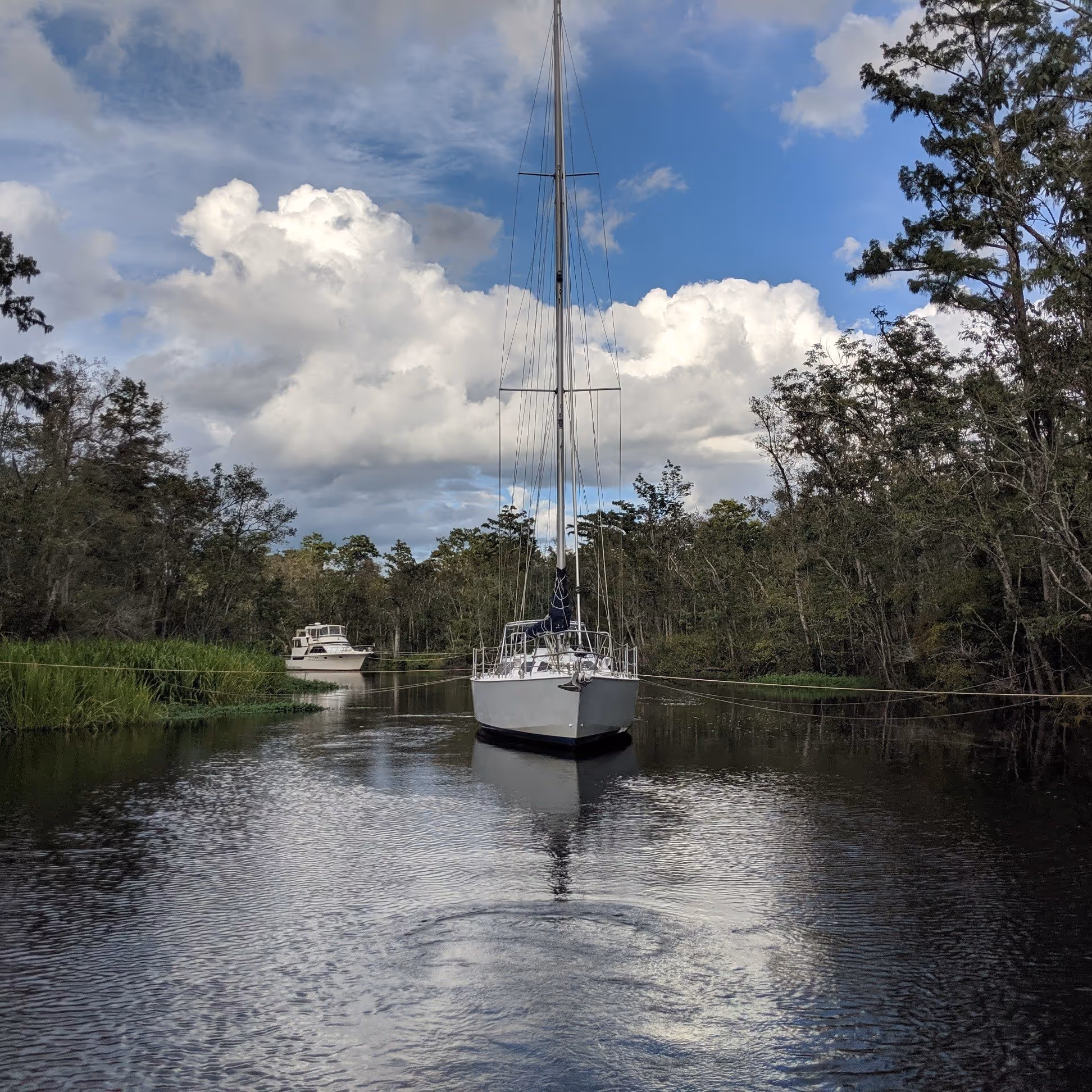 preparing boat for a hurricane in a canal or river