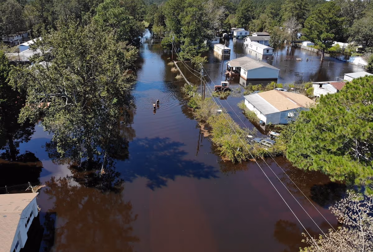 Flooded neighborhood with submerged roads.